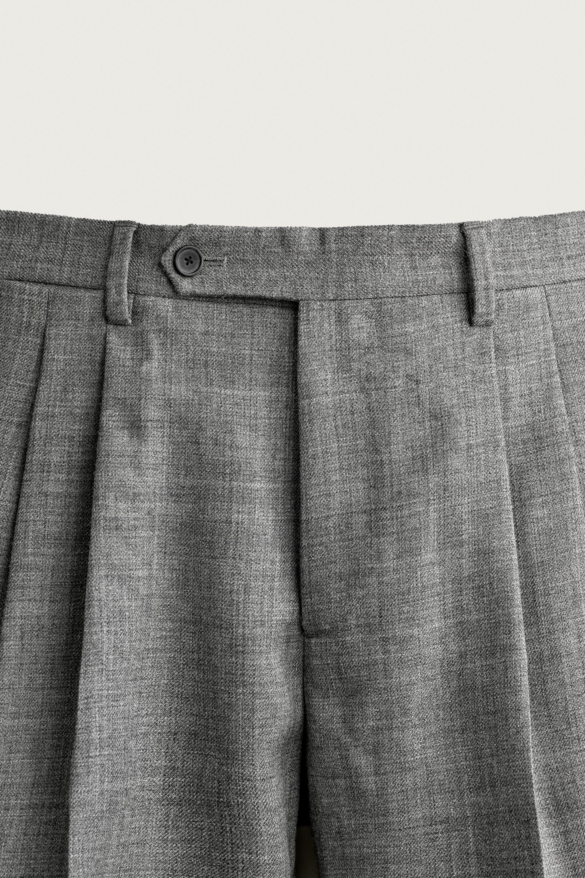 100% WOOL PLEATED PANTS